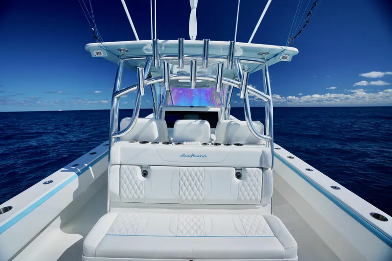  Yacht Photos Pics 2020 SeaHunter 46 CTS boat interior with ocean view, featuring white seating and sleek design.