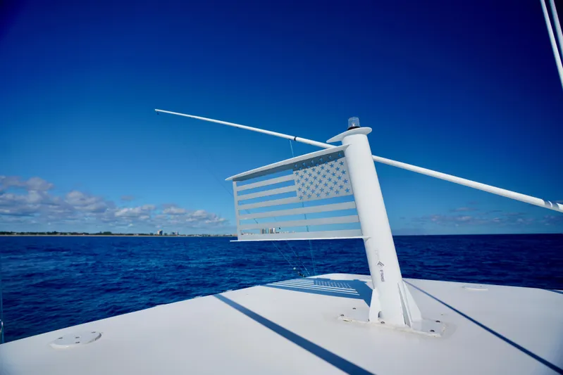  Yacht Photos Pics SeaHunter 46 CTS boat with American flag on open ocean, 2020 model.