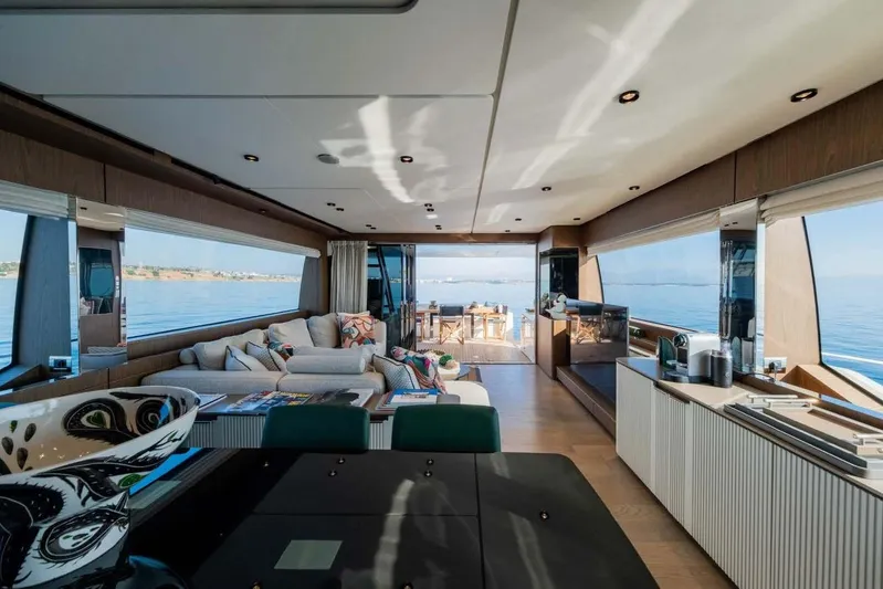  Yacht Photos Pics Luxurious interior of 2021 Ferretti Yachts 780 with modern furnishings and ocean view.