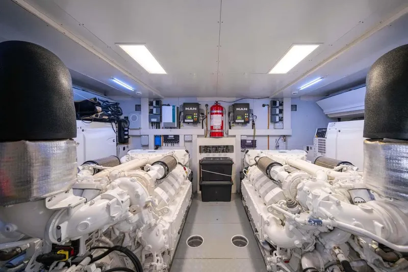  Yacht Photos Pics Engine room of 2021 Ferretti Yachts 780, featuring dual MAN engines and modern equipment.
