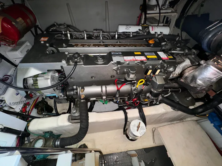  Yacht Photos Pics Engine compartment of a 2005 Sabre 38 boat, showcasing detailed mechanical components.