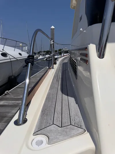  Yacht Photos Pics 2005 Sabre 38 yacht deck with sleek design and polished railings.