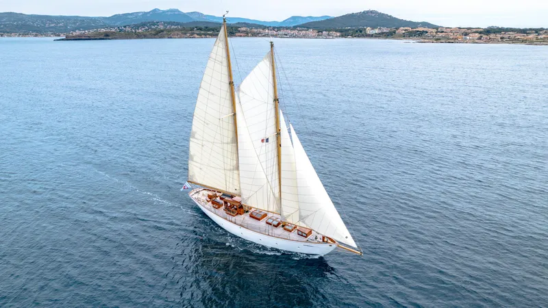 Armide Yacht Photos Pics 1938 Custom sailboat by Classic Works sailing on open water.