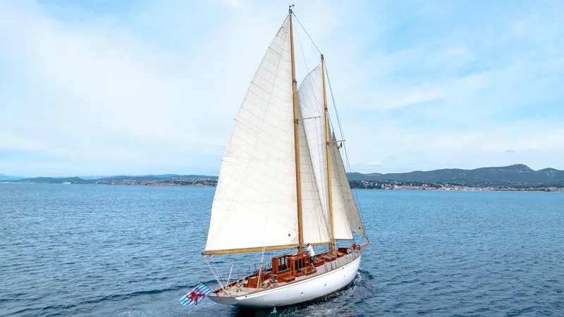 Armide Yacht Photos Pics Vintage 1938 Custom sailboat by Classic Works sailing on open water.