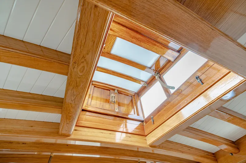 Armide Yacht Photos Pics 1938 Custom Classic Works wooden boat interior with skylight.