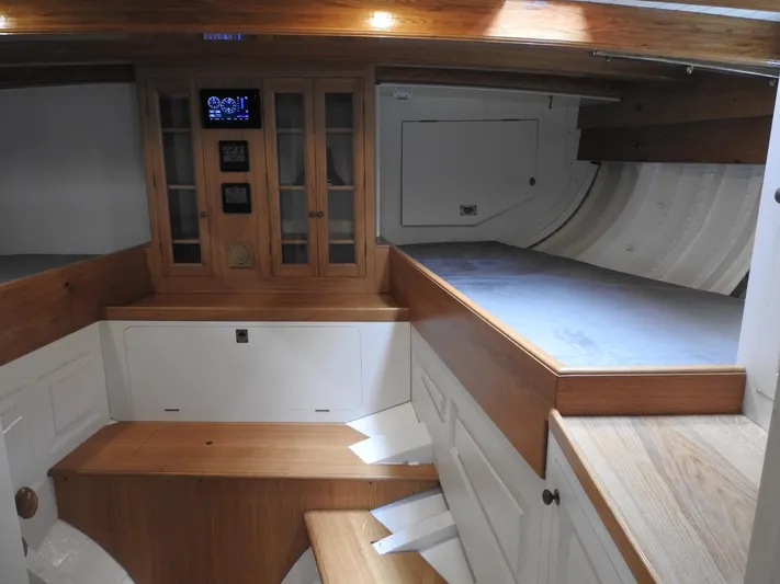 Armide Yacht Photos Pics 1938 Custom By Classic Works boat interior with wooden cabinetry and modern controls.
