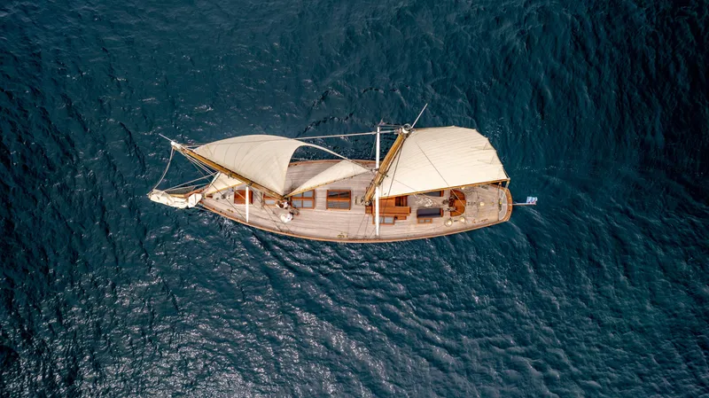 Armide Yacht Photos Pics Aerial view of a 1938 Custom sailboat by Classic Works on the open sea.