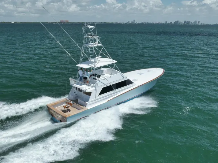 Bird Dog Yacht Photos Pics 1989 Jim Smith Custom Convertible yacht cruising on open water.