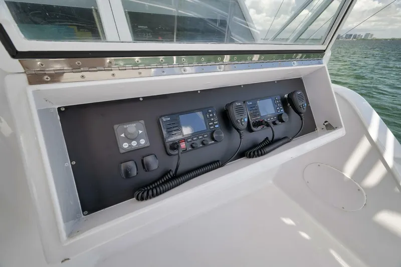 Bird Dog Yacht Photos Pics Control panel of a 1989 Jim Smith Custom Convertible boat with communication devices.