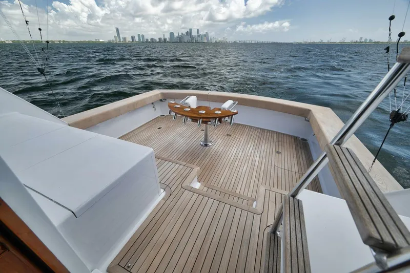 Bird Dog Yacht Photos Pics 1989 Jim Smith Custom Convertible yacht deck with city skyline in background.