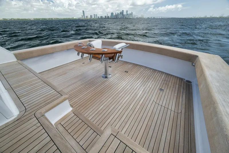 Bird Dog Yacht Photos Pics Luxurious 1989 Jim Smith Custom Convertible yacht deck with city skyline view.