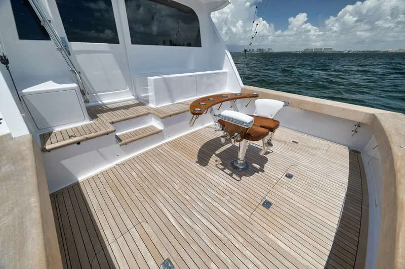 Bird Dog Yacht Photos Pics Luxurious 1989 Jim Smith Custom Convertible yacht deck with fishing chair, ocean view.