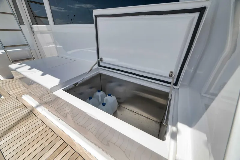 Bird Dog Yacht Photos Pics Open storage compartment on 1989 Jim Smith Custom Convertible yacht deck.