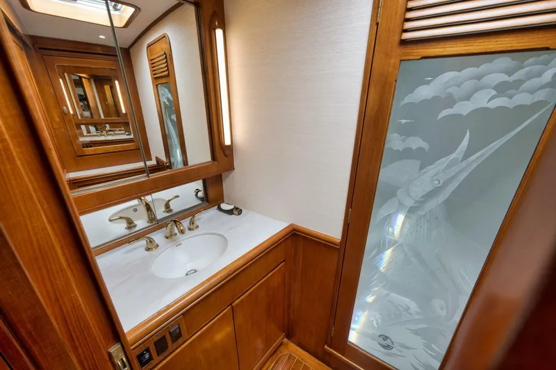 Bird Dog Yacht Photos Pics Luxurious wooden bathroom interior in 1989 Jim Smith Custom Convertible yacht.