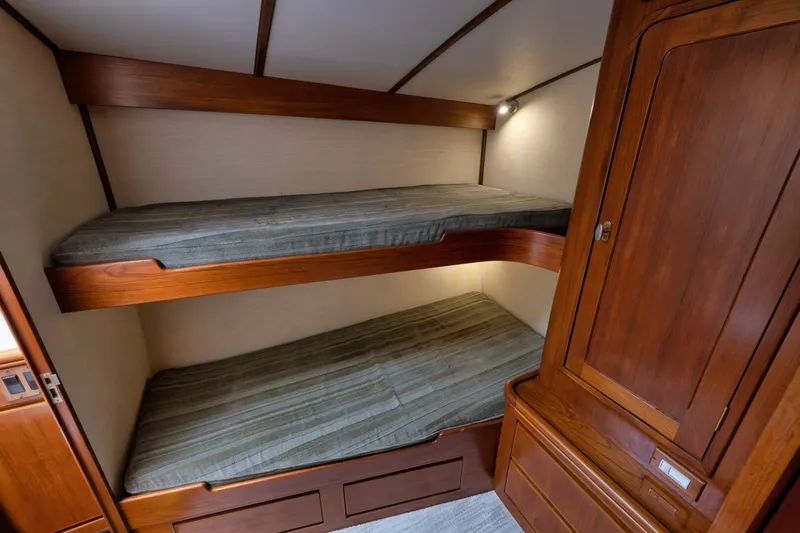 Bird Dog Yacht Photos Pics Wooden bunk beds in a 1989 Jim Smith Custom Convertible yacht cabin.