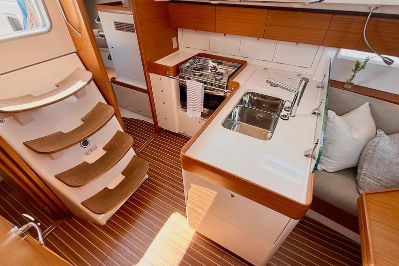 Spectre Yacht Photos Pics Interior of 2016 X-Yachts Xp38, featuring modern kitchen and wooden flooring.
