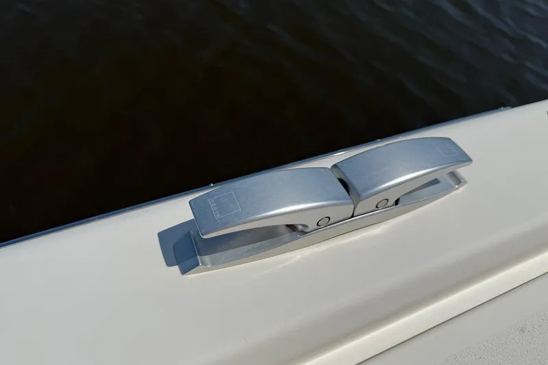 Spectre Yacht Photos Pics Sleek cleat on 2016 X-Yachts Xp38 sailboat, docked on calm water.