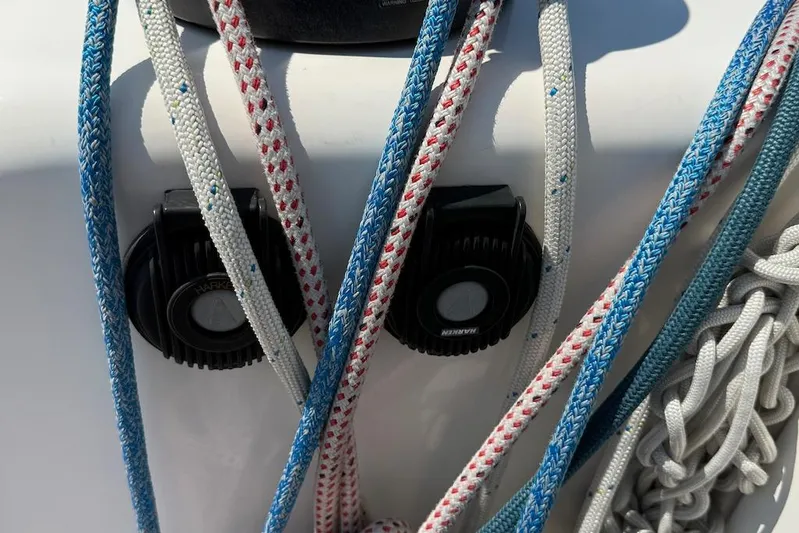 Spectre Yacht Photos Pics Colorful ropes and winches on a 2016 X-Yachts Xp38 sailboat deck.