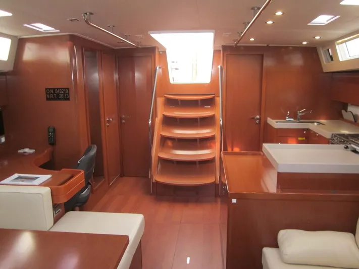 Cameli Yacht Photos Pics Luxurious interior of 2020 Beneteau Oceanis 55.1 yacht with modern wood finish.