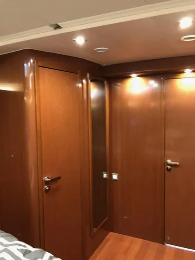 Cameli Yacht Photos Pics Interior of 2020 Beneteau Oceanis 55.1 yacht with wooden finish and modern lighting.