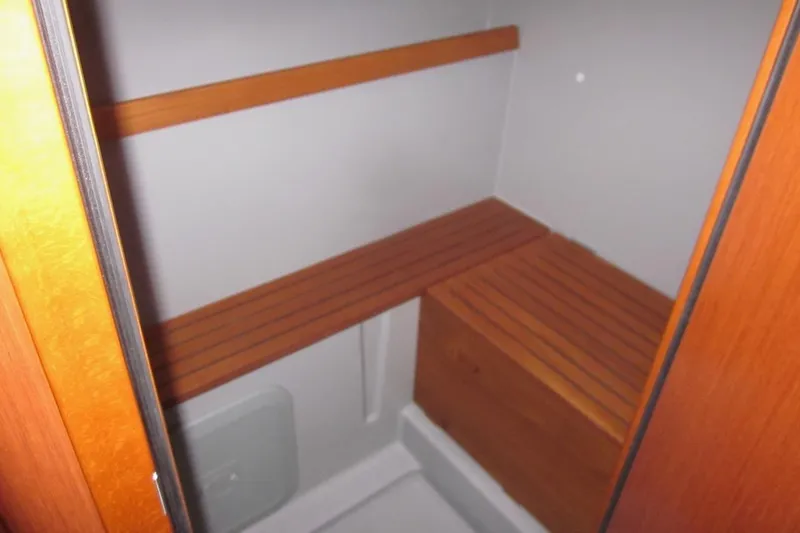 Cameli Yacht Photos Pics Interior wooden storage area on 2020 Beneteau Oceanis 55.1 yacht.