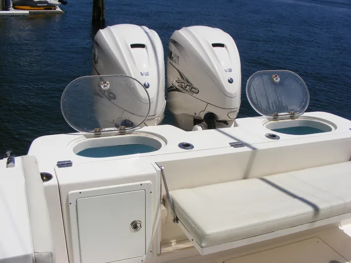  Yacht Photos Pics 2020 Cobia 350 Center Console with twin V8 engines and open storage compartments.