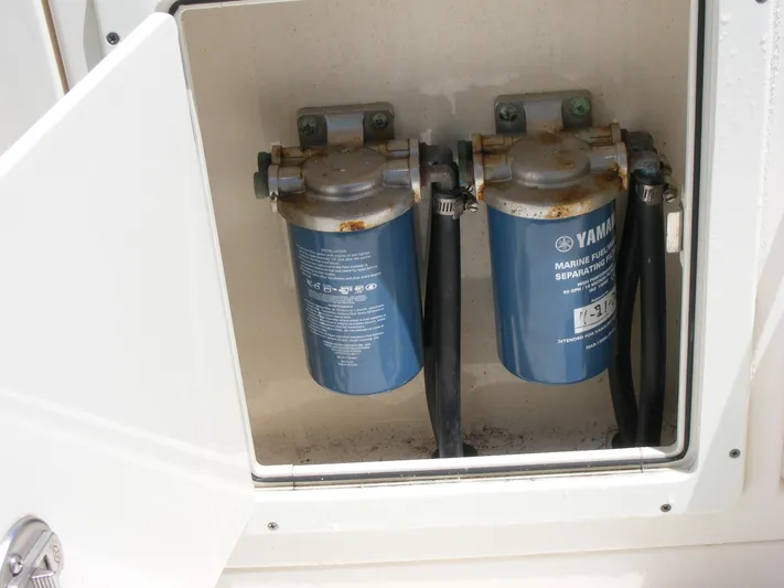  Yacht Photos Pics Fuel filters in a 2020 Cobia 350 Center Console boat compartment.