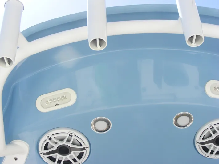  Yacht Photos Pics 2020 Cobia 350 Center Console boat with blue hull and rod holders.