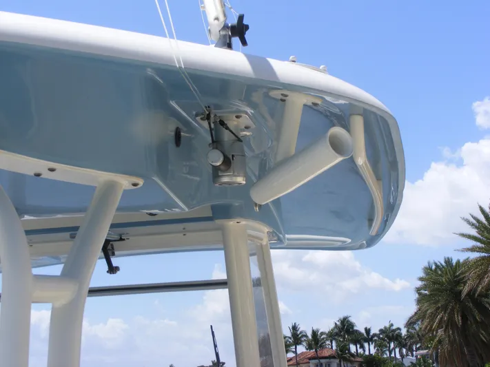  Yacht Photos Pics 2020 Cobia 350 Center Console boat detail with blue sky and palm trees.