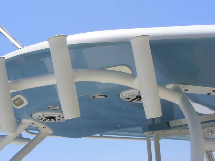  Yacht Photos Pics 2020 Cobia 350 Center Console boat's T-top with rod holders and speakers.