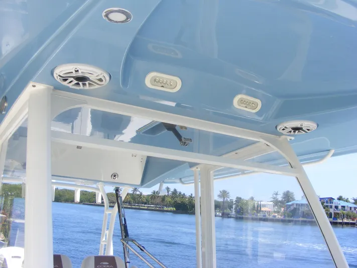  Yacht Photos Pics 2020 Cobia 350 Center Console boat interior with blue ceiling and speakers.