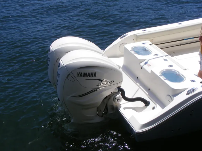  Yacht Photos Pics 2020 Cobia 350 Center Console with Yamaha outboard engines on water.