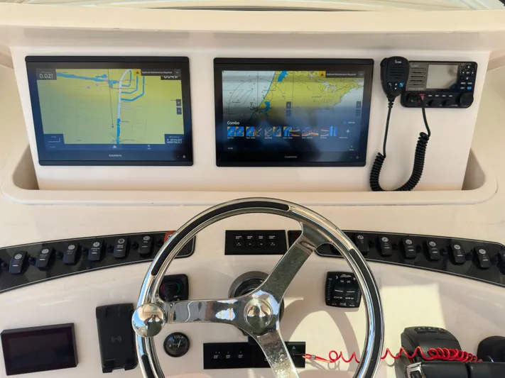  Yacht Photos Pics 2023 Grady-White Canyon 376 helm with dual Garmin displays and marine radio.