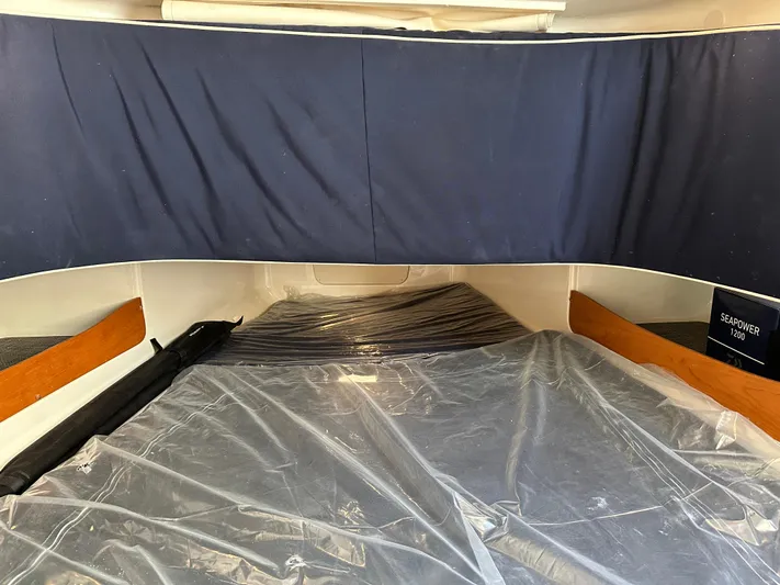  Yacht Photos Pics 2023 Grady-White Canyon 376 cabin interior with protective plastic covering.