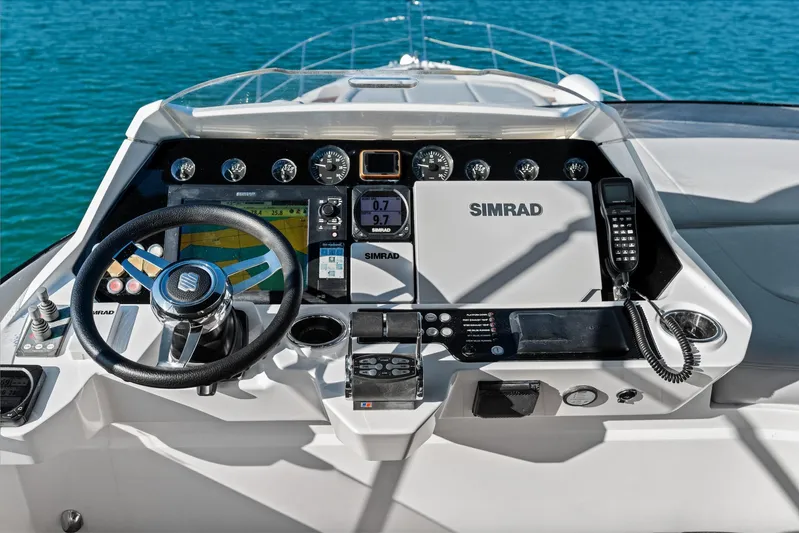 Gem Yacht Photos Pics Helm of 2014 Sunseeker 68 Sport Yacht with Simrad navigation system.