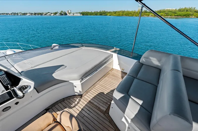 Gem Yacht Photos Pics Luxurious deck of 2014 Sunseeker 68 Sport Yacht with scenic ocean view.