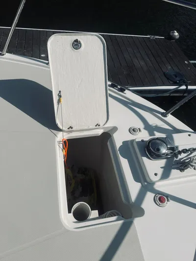 Someday Yacht Photos Pics 2012 Back Cove 34 boat deck with open storage compartment.
