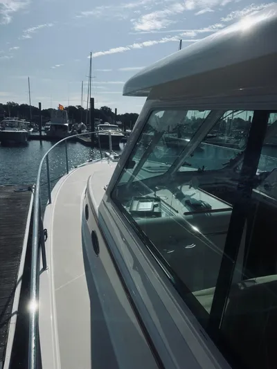 Someday Yacht Photos Pics 2012 Back Cove 34 yacht docked at marina under clear sky.