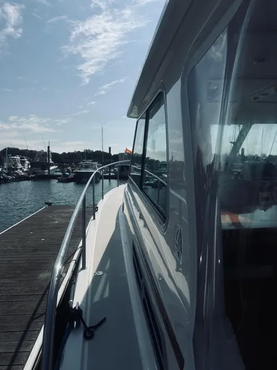 Someday Yacht Photos Pics 2012 Back Cove 34 yacht docked at marina under clear sky.