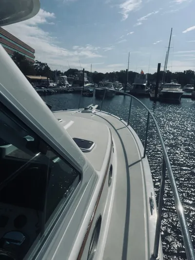 Someday Yacht Photos Pics 2012 Back Cove 34 boat docked in a sunny marina.