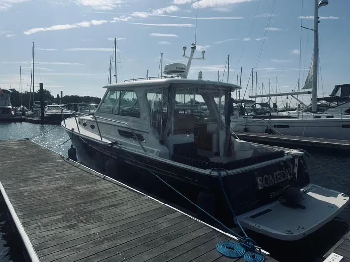Someday Yacht Photos Pics 2012 Back Cove 34 boat docked at marina under clear sky.