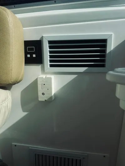 Someday Yacht Photos Pics Interior of 2012 Back Cove 34 boat with air vent and control panel.