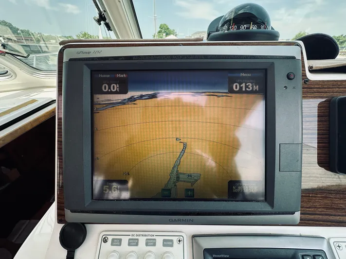 Someday Yacht Photos Pics Garmin GPS display on 2012 Back Cove 34 boat dashboard, showing navigation data.
