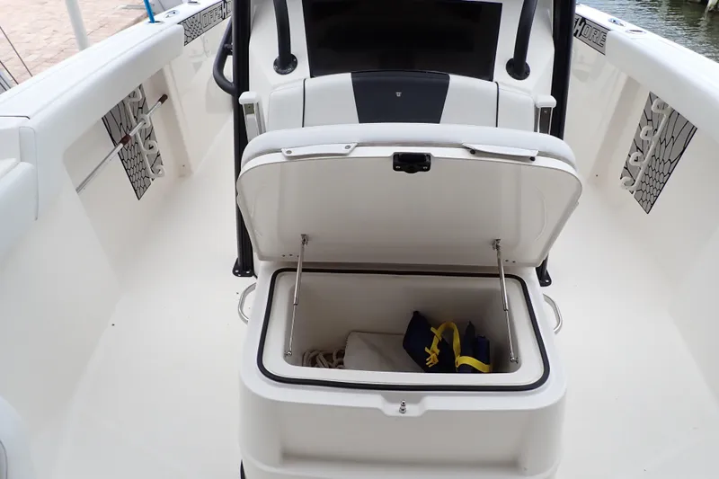  Yacht Photos Pics 2019 Wellcraft 352 Fisherman boat interior with open storage compartment.