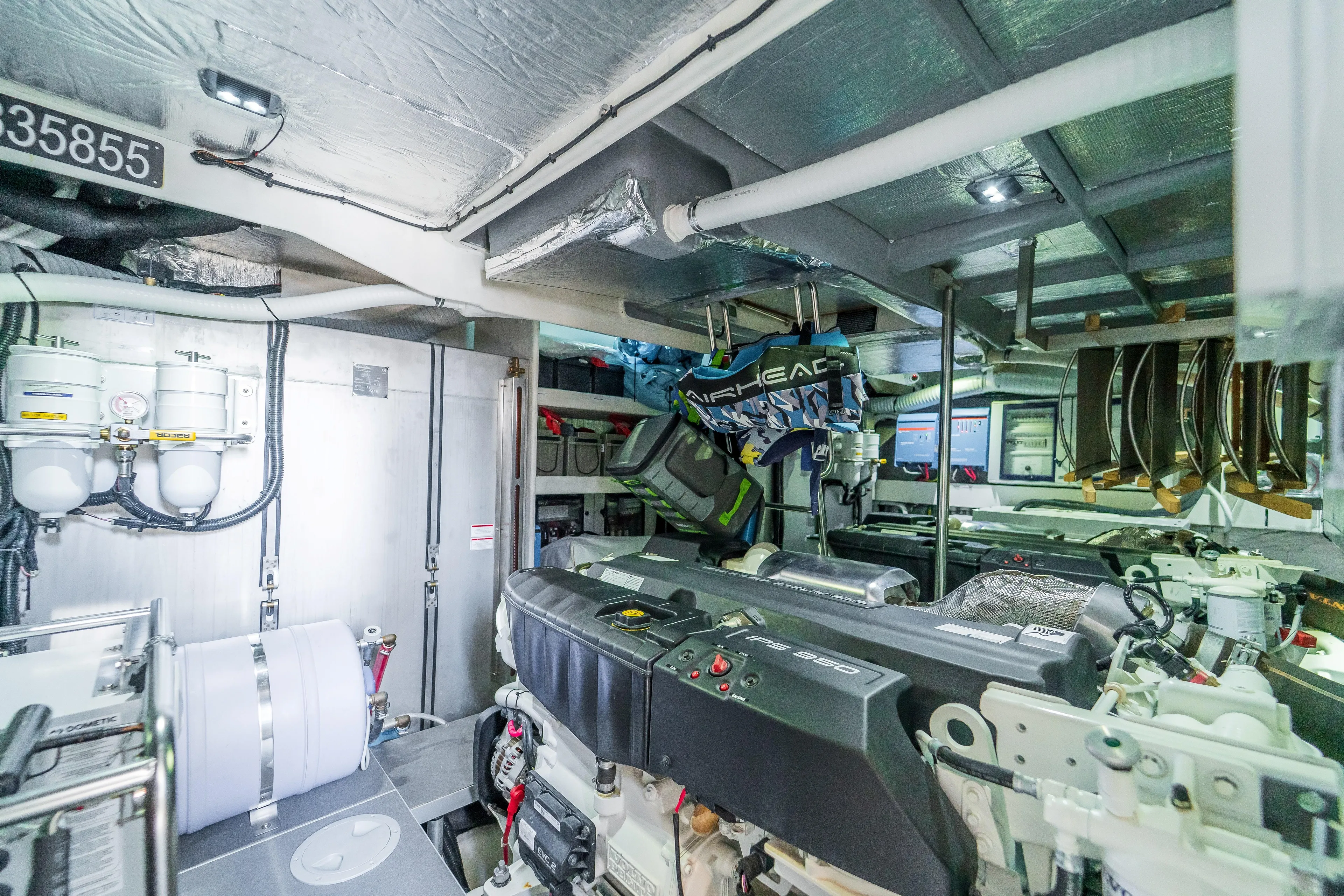  Yacht Photos Pics Engine room of 2023 Absolute 62 Fly yacht, showcasing advanced machinery and equipment.