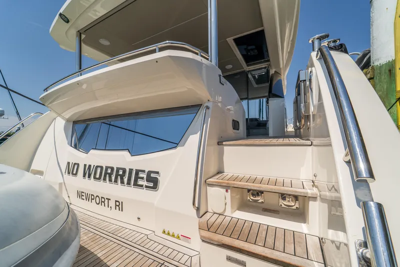  Yacht Photos Pics 2023 Absolute 62 Fly yacht, rear view, docked in Newport, RI.