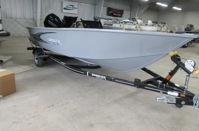 2023 Smoker Craft Freedom 160 TL boat on trailer in showroom.