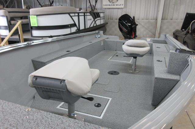 2023 Smoker Craft Freedom 160 TL boat interior with seating and motor.