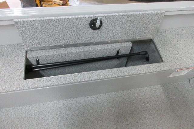 2023 Smoker Craft Freedom 160 TL boat storage compartment with open lid.