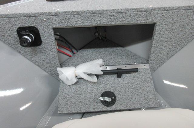 2023 Smoker Craft Freedom 160 TL boat interior storage compartment.
